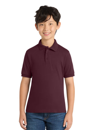 Port & Co™ Youth Core Blend Jersey Knit Polo. KP55Y - Athletic Maroon | Port & Co